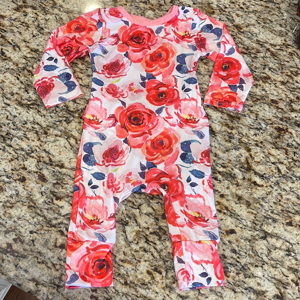 0-6 month baby girl onesie by Banded LLC.